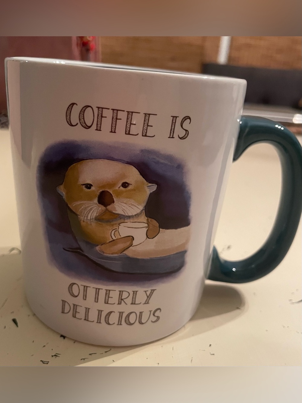 Otter Illustration Ceramic Coffee Mug with Teal Handle